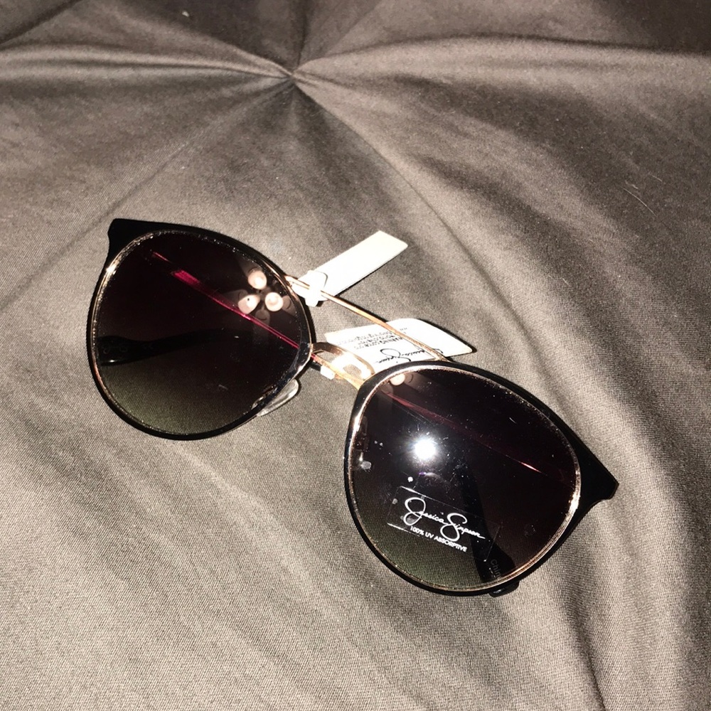 Black and gold Jessica Simpson sunglasses